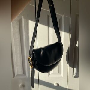 Black shoulder bag gold hardware